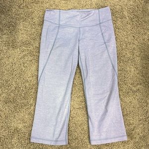 Lululemon heather grey capris with cute slit at the bottom